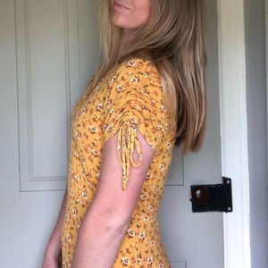 Francesca’s yellow flour printed dress